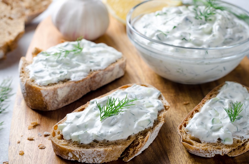 Creamy yogurt dip served on healthy rye bread