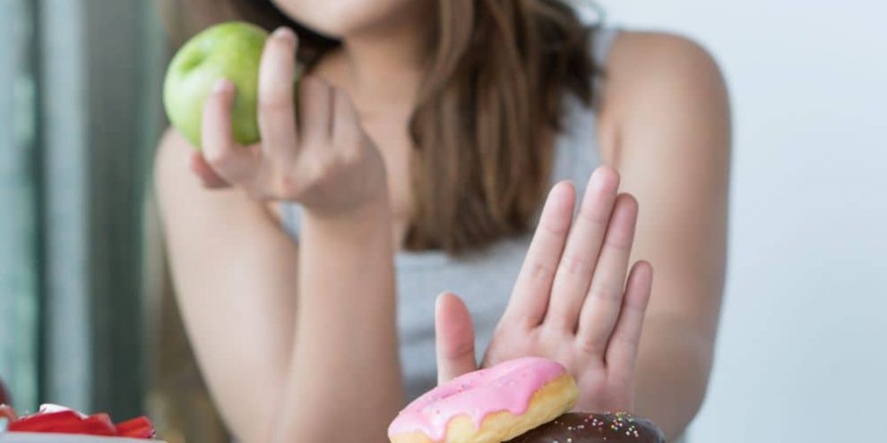 Woman avoiding processed food.