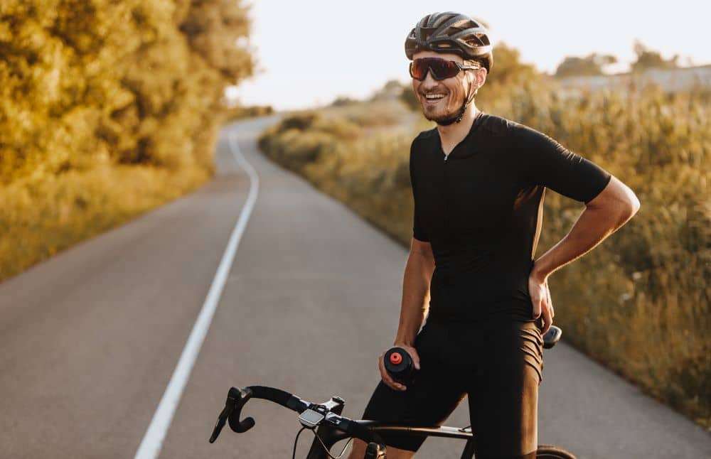 Man taking a break from cycling.