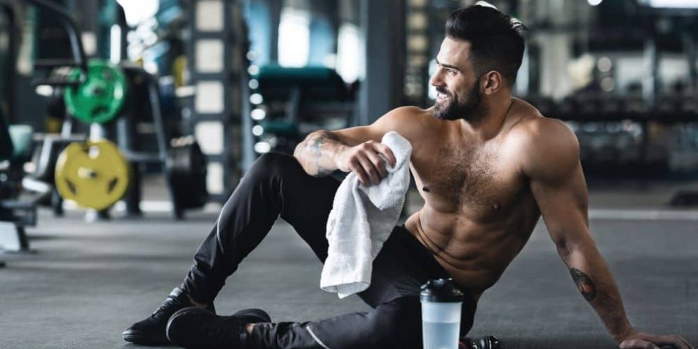 Man resting after training at the gym.