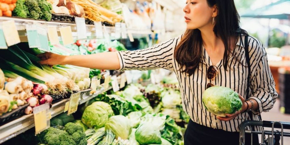 Woman grocery shopping.